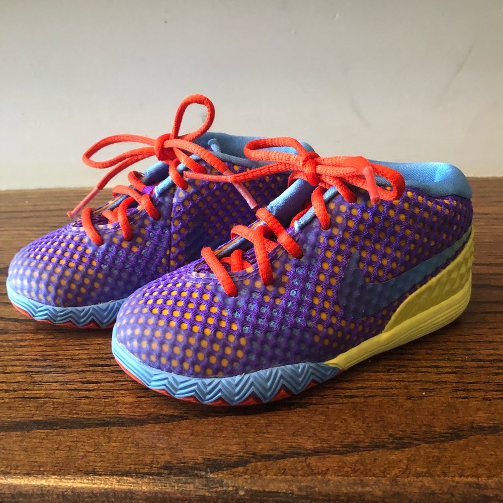 Kids Kyrie multi-color Nike shoe